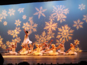 Mikaley Bolden, as Clara, performing with the snow in show B.