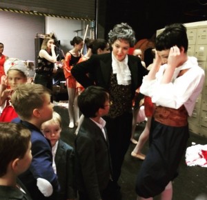 As they wait for Coppelia to begin, Caroline Kassir and Kate Erath interact with our younger students backstage.